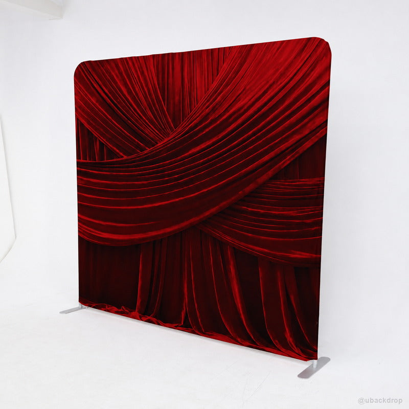 Angled red velvet wall party stand event photo backdrop