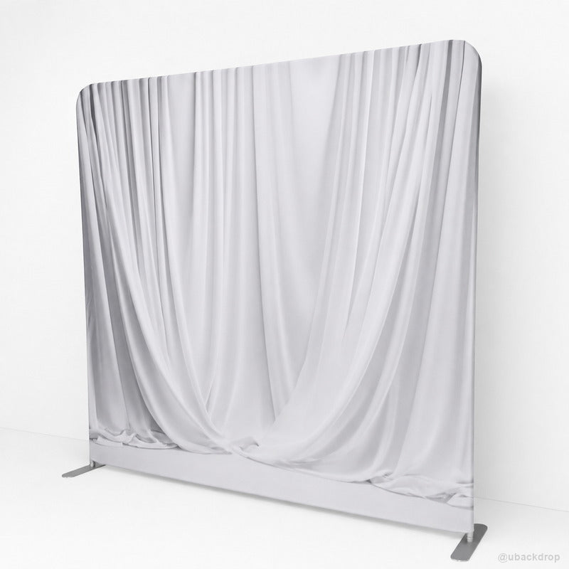 Angled white draped wall party stand event photo backdrop