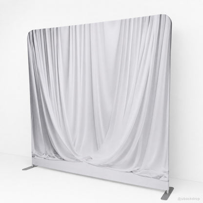 Angled white draped wall party stand event photo backdrop