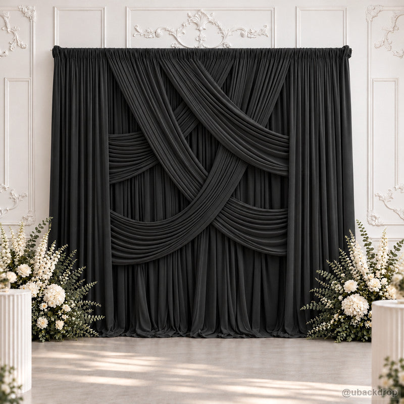Black cross layered drape wedding backdrop with flowers