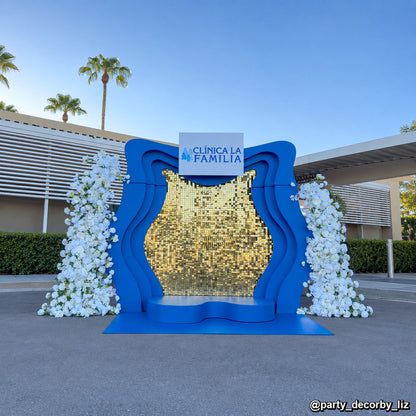 Blue gold sequin photo booth shimmer wall frame floral event backdrop installation