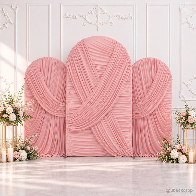 Blush pink crossed pleated fabric triple arch party backdrop