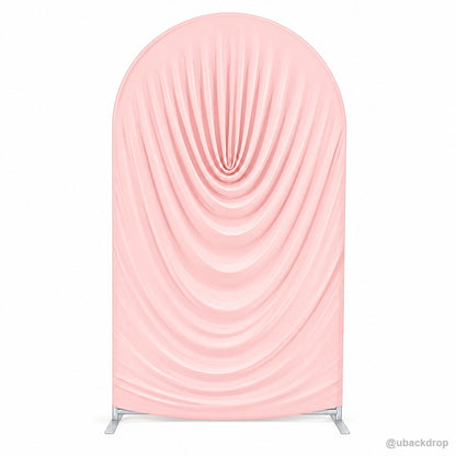 Blush pink ruched fabric arch party stand front product display