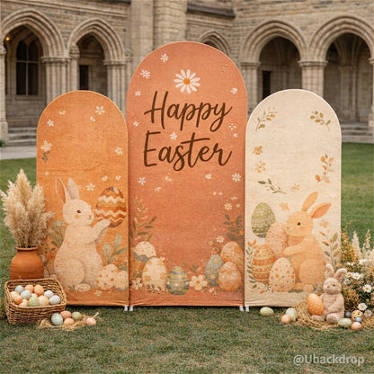 Chiara arched Easter backdrop set. Three fabric panels: orange with bunnies, eggs, and "Happy Easter" text.