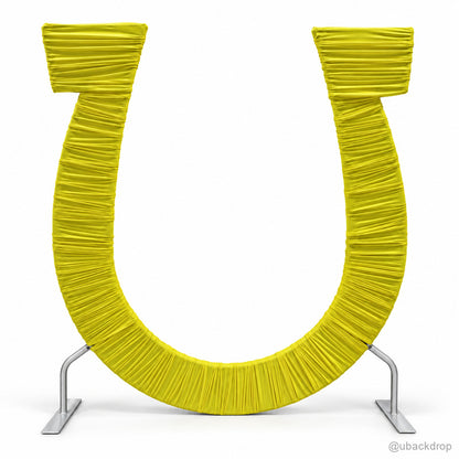 Bright yellow ruched fabric u shaped event backdrop arch front view