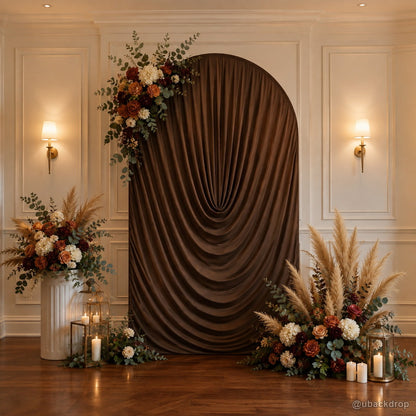 Brown ruched fabric arch autumn floral wedding party backdrop