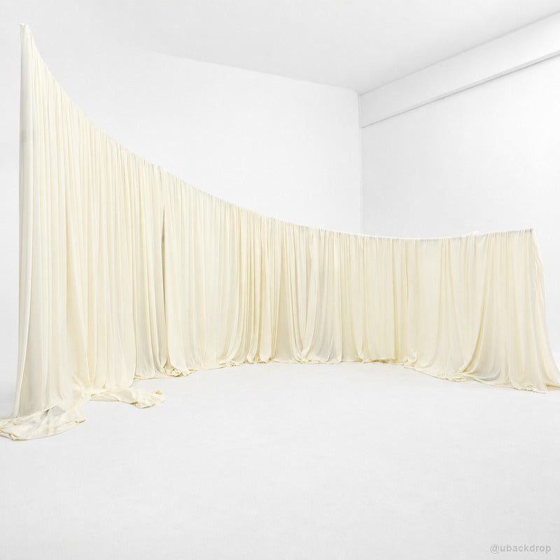 Cream corner wave drapery wall party event backdrop