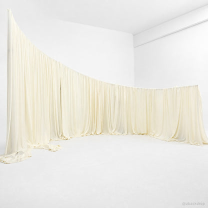Cream corner wave drapery wall party event backdrop