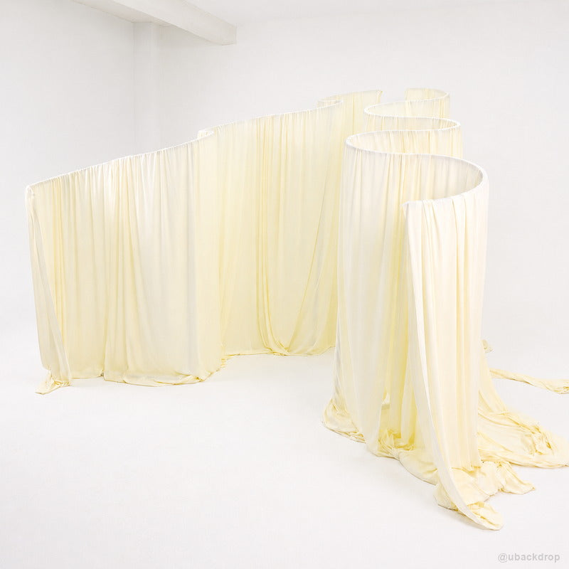 Cream serpentine drapery wall party stand wedding backdrop