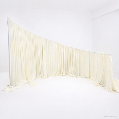 Cream sweeping drapery wall wedding party photo backdrop