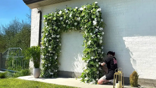Installing our flower wall arch for an Engagement party!! 
