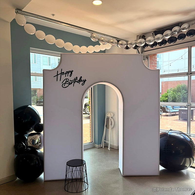 Gray balloon photo booth birthday party backdrop stand
