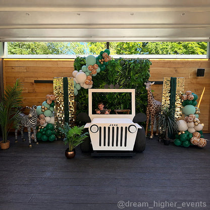 Green balloon jeep photo booth wide event backdrop
