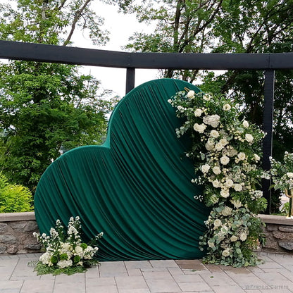 Green curved party stand white floral outdoor wedding backdrop