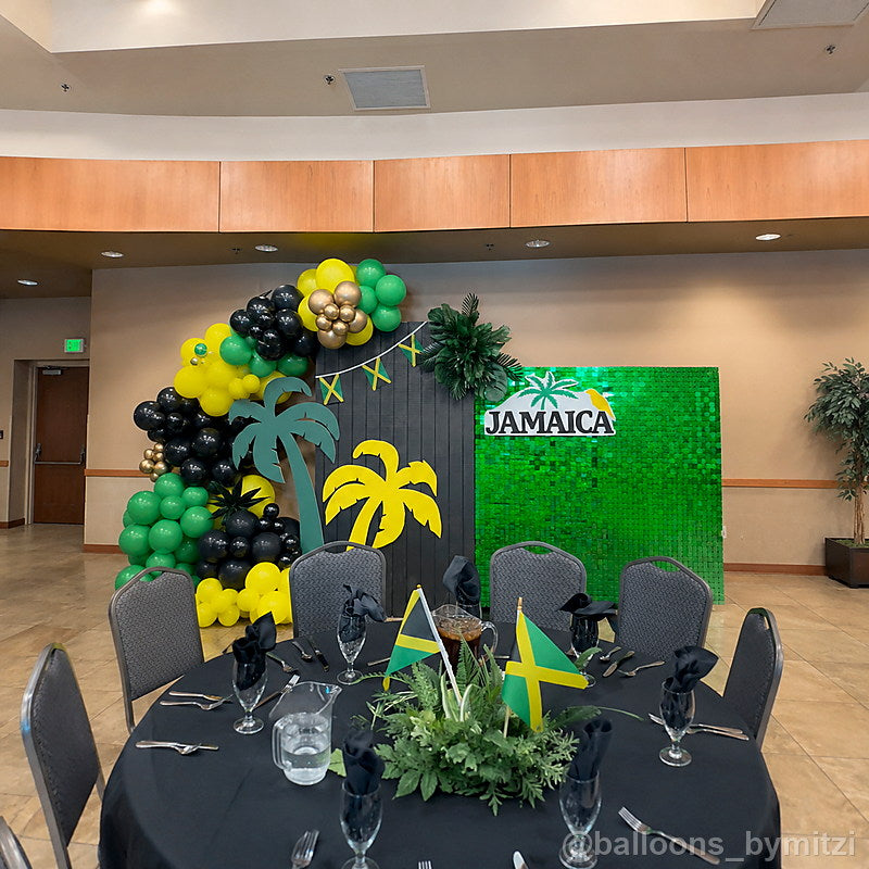 Green jamaica themed balloon party display backdrop