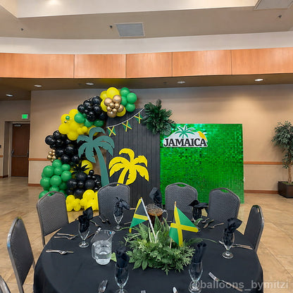 Green jamaica themed balloon party display backdrop