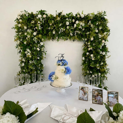 Green white floral table arch elegant wedding cake backdrop