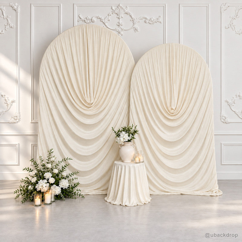Ivory cowl draped fabric double arch wedding backdrop