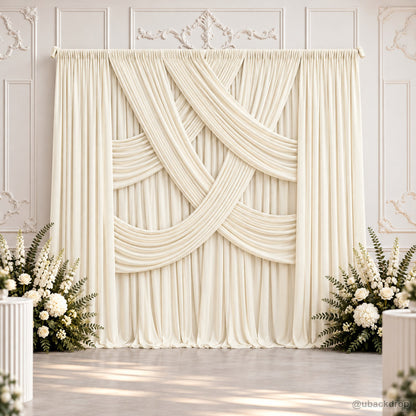 Ivory cross layered drape wedding backdrop with flowers