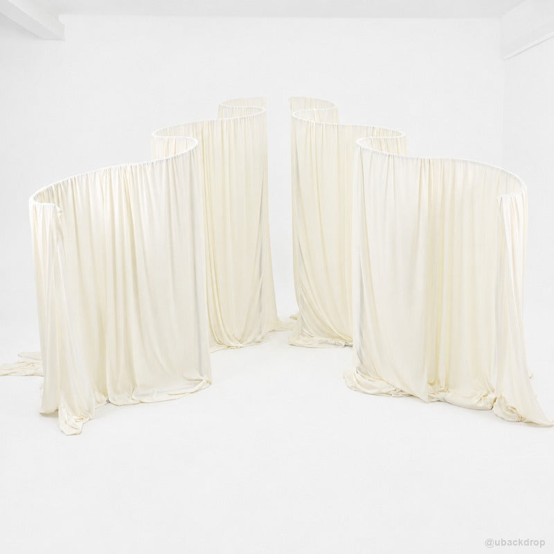 Ivory serpentine drapery wall party stand event backdrop