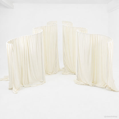 Ivory serpentine drapery wall party stand event backdrop