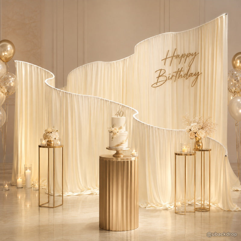 Ivory wave drapery party stand elegant birthday event backdrop