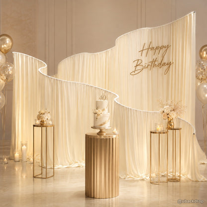 Ivory wave drapery party stand elegant birthday event backdrop