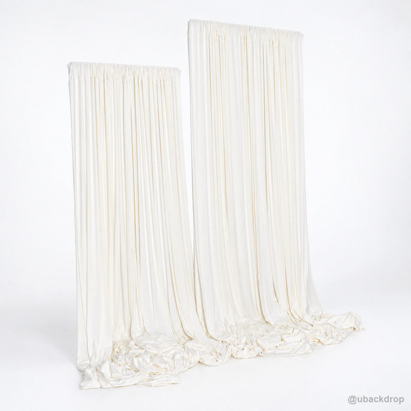 Ivory white draped double panel backdrop on t stands left angle