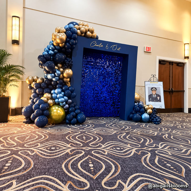 Navy blue sequin shimmer wall balloon arch hotel celebration event backdrop