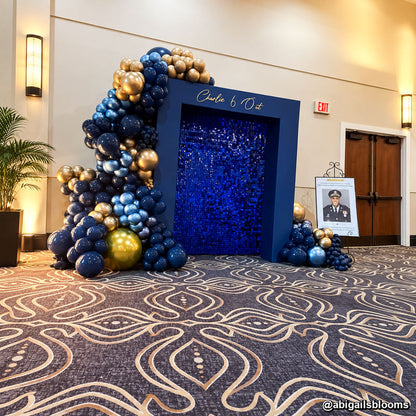 Navy blue sequin shimmer wall balloon arch hotel celebration event backdrop