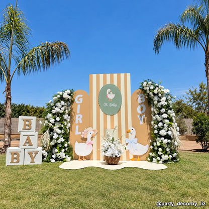 Neutral baby shower floral backdrop duck themed balloon arch garden event display