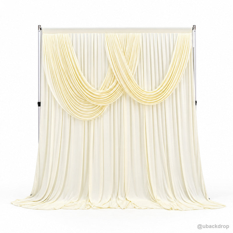 Pale yellow double swag draped backdrop front product view