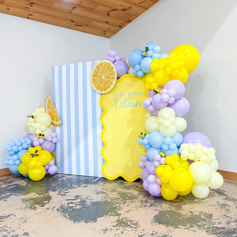 Pastel lemonade balloon party stand summer birthday backdrop display