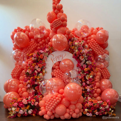 Pink coral balloon arch floral birthday party backdrop display