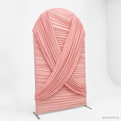 Pink crossed drapery arch party stand left side view