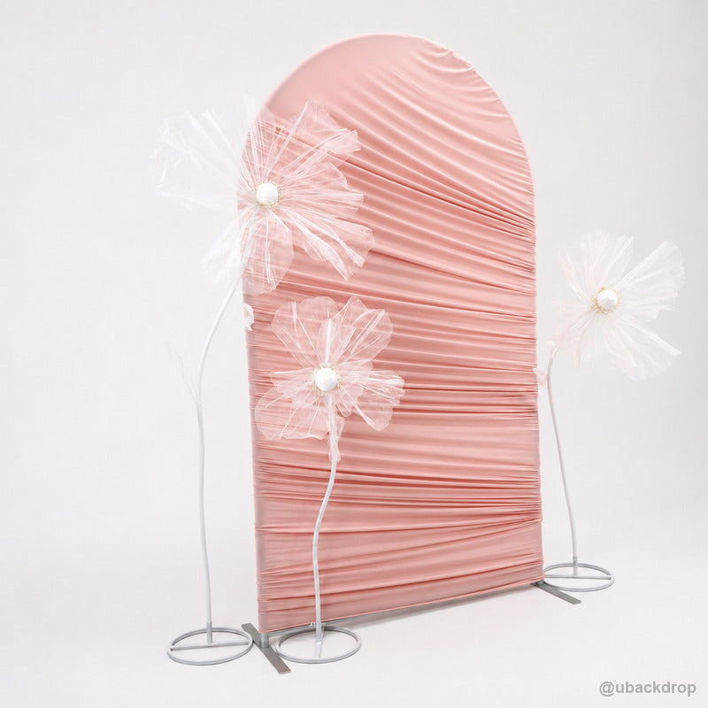 Pink horizontal ruched arch flower party stand angled view