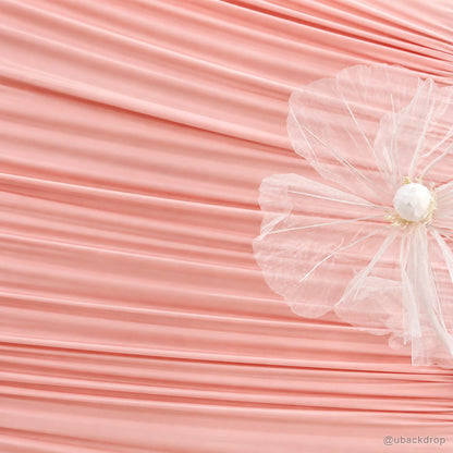 Pink horizontal ruched fabric flower party backdrop detail view