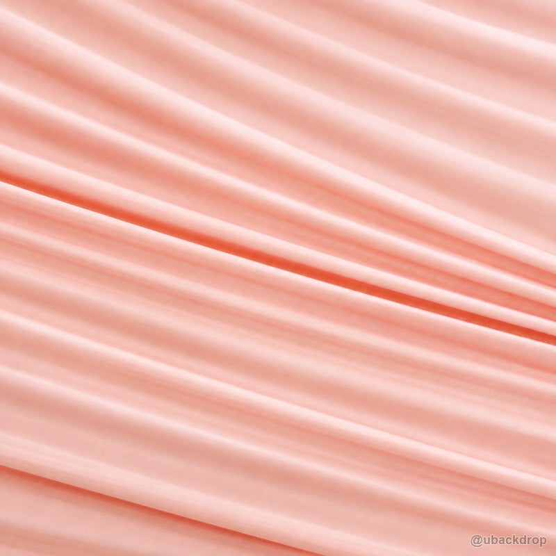 Pink horizontal ruched fabric party backdrop closeup texture detail