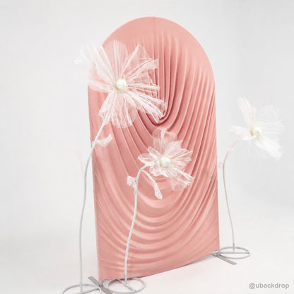 Pink ruched arch party stand floral decor angled view