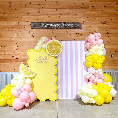 Pink yellow lemonade balloon party stand birthday backdrop display