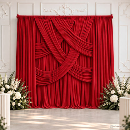 Red cross layered drape wedding backdrop with flowers