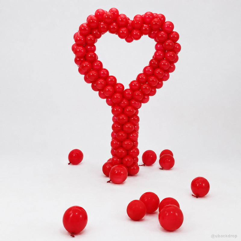 Red heart balloon sculpture romantic party photo backdrop