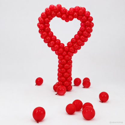 Red heart balloon sculpture romantic party photo backdrop