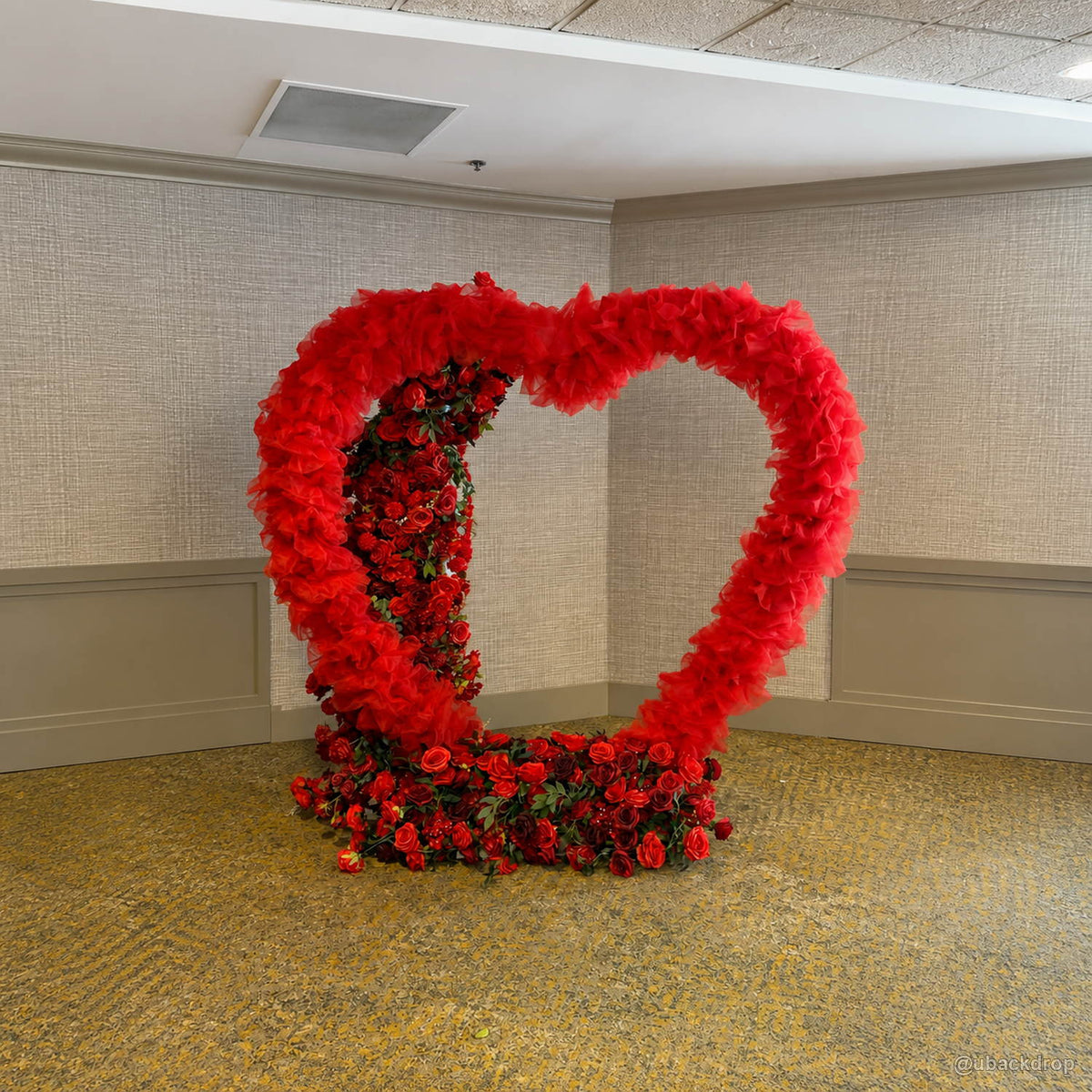 Red heart flower wall romantic wedding event photo backdrop