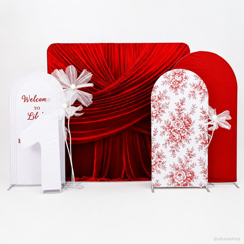 Red velvet draped wall layered arch party photo backdrop