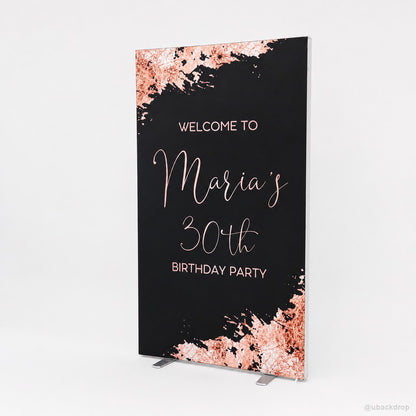rose-gold-birthday-welcome-backdrop-banner-stand-angled-view.jpg