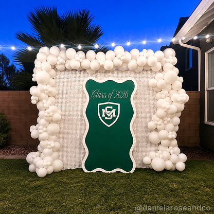 White balloon party stand school logo backdrop