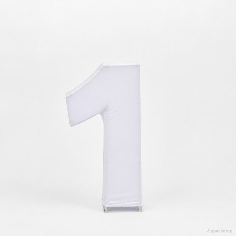 White covered number one party stand first birthday decor