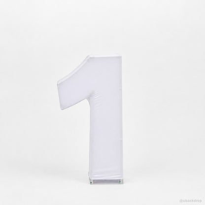 White covered number one party stand first birthday decor