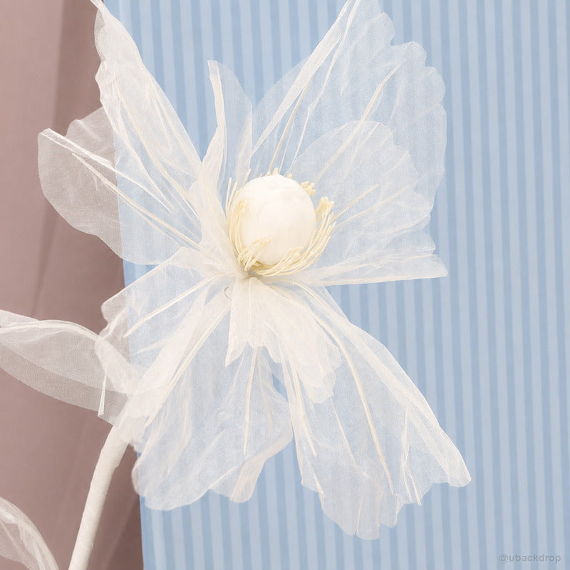 White organza flower blue panel party backdrop detail
